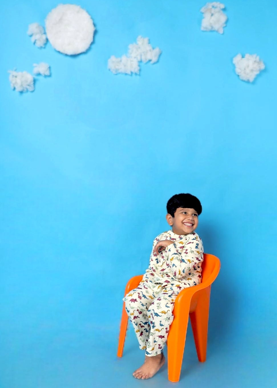 Kids cream cotton kurta and pants co-ord set with dinosaur print, full sleeves, round neck, loose fit, soft and comfortable nightwear.