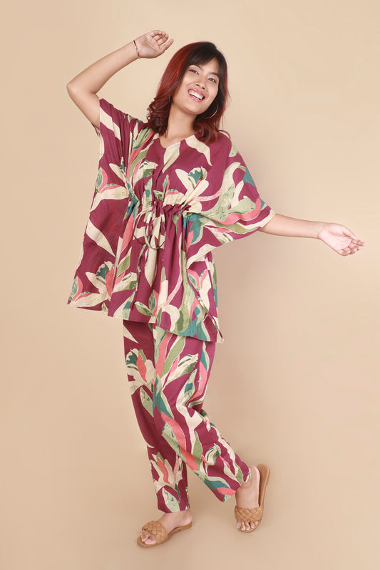 Woman wearing a floral outfit on a beige background