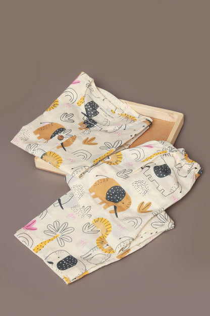 Child wearing kurta pajamas set with animal prints