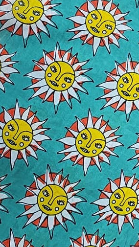 Colorful fabric with sun pattern on a摊位