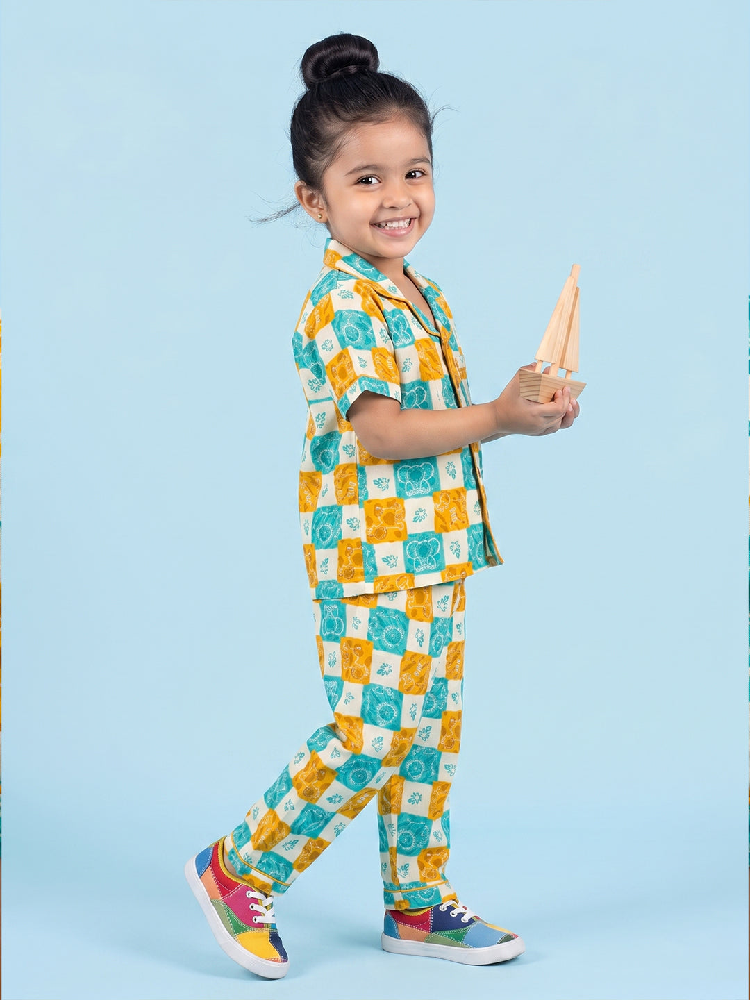 Kids Playing in checkered nighsuit pajama set