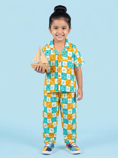 Kids Playing in checkered nighsuit pajama set