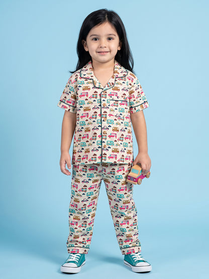 Kids pajama nightsuit with bus and car print standing