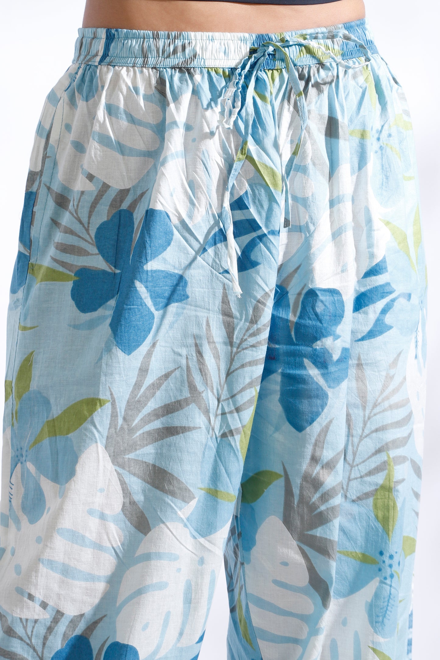 Floral patterned shorts on a white background
