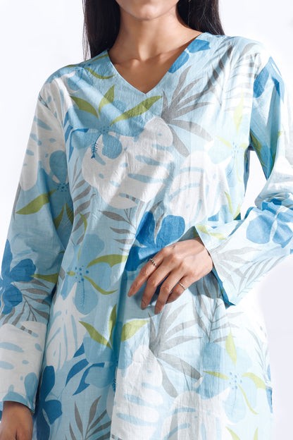 Light blue and white floral patterned dress worn by a person